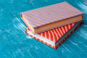 paperback books on a table