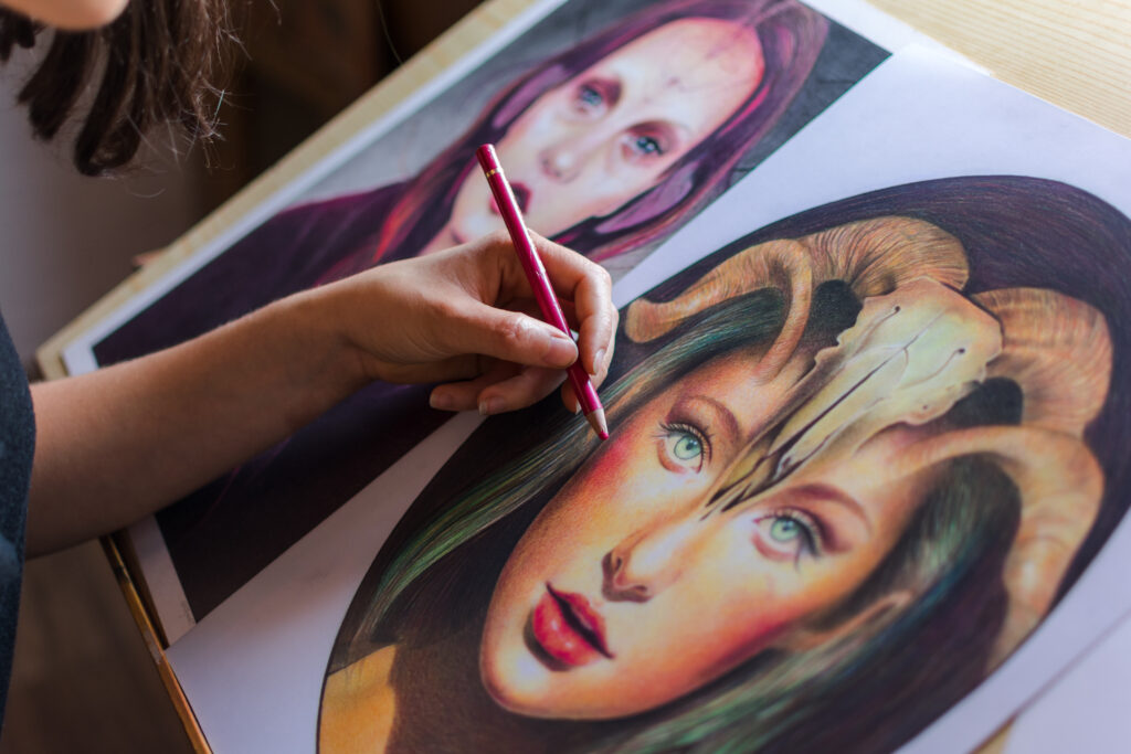 Painter making an artistic portrait. Close-up image. Work, art, lifestyle.